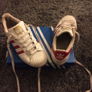 Adidas with red stripe